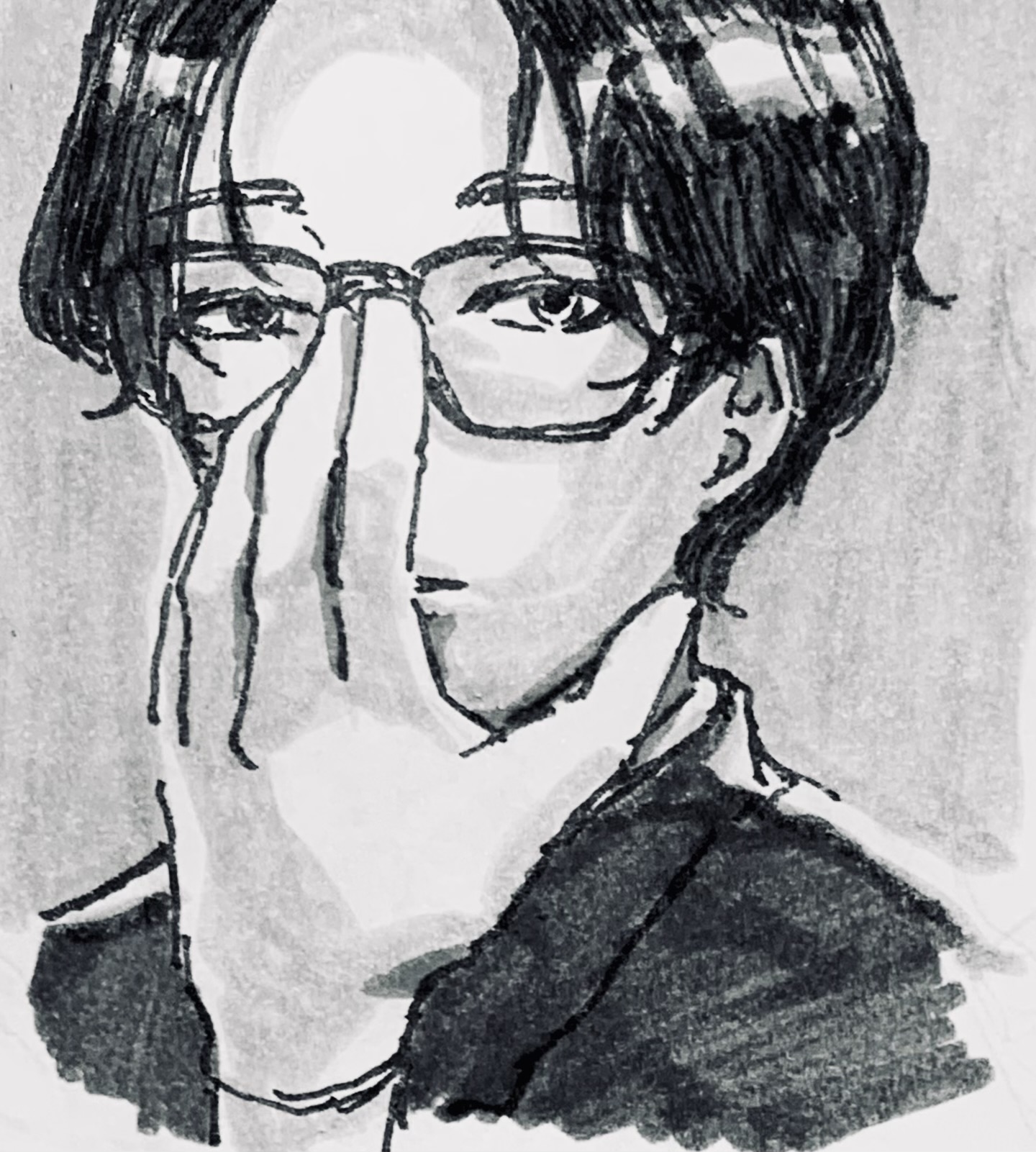 メガネの男